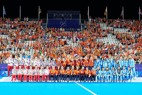 Women's field hockey medal ceremony: China's silver-medallists, Netherlands' gold-medallists and Argentina's bronze-medallists